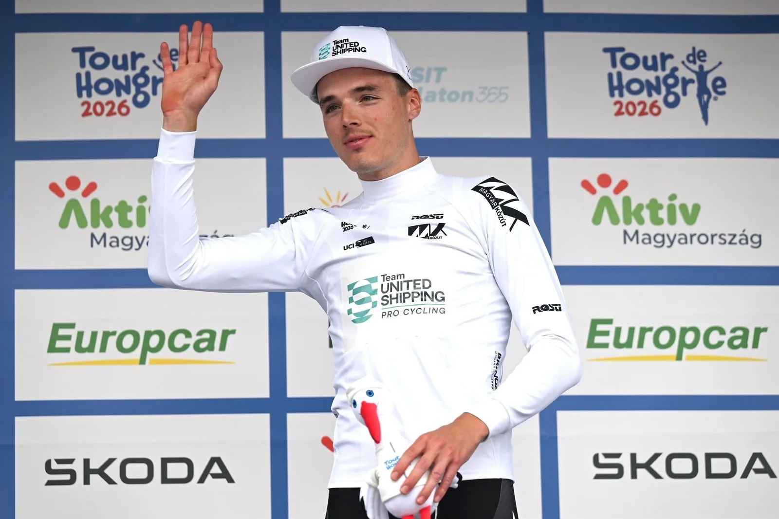 PAKS, HUNGARY - MAY 14: Erik Fetter of Hungary and Team United Shipping celebrates at podium as White best Hungarian rider jersey during the 47th Tour of Hungary 2026, Stage 2 a 205.8km stage from Szarvas to Paks on May 14, 2026 in Paks, Hungary. (Photo by Luc Claessen/Getty Images)