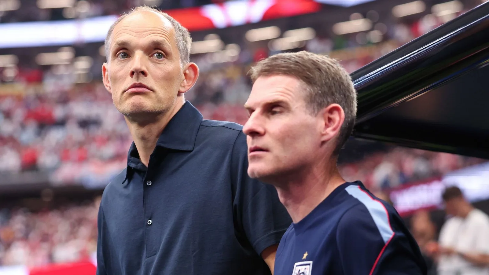 England's Thomas Tuchel and Anthony Barry in the dugout for England vs Croatia at World Cup 2026