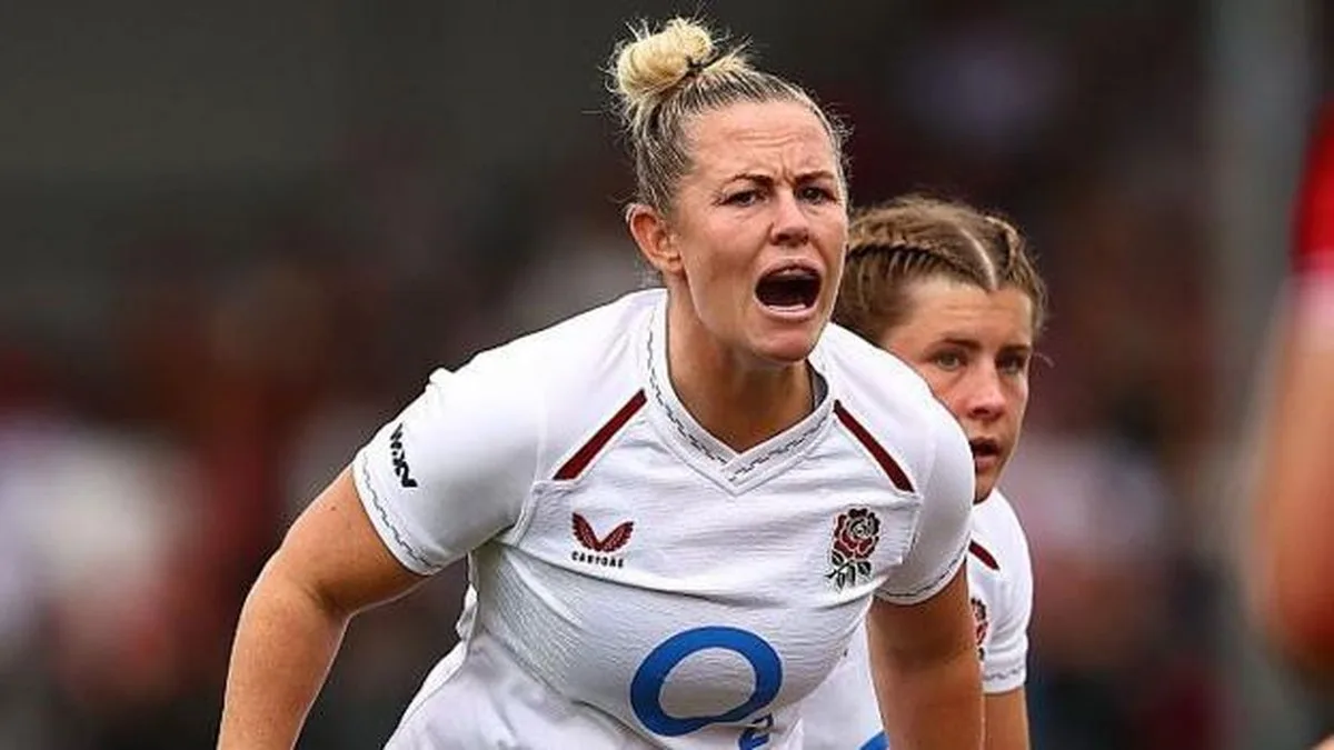 Marlie Packer, wearing England's white home kit, shouts instructions to a team-mate