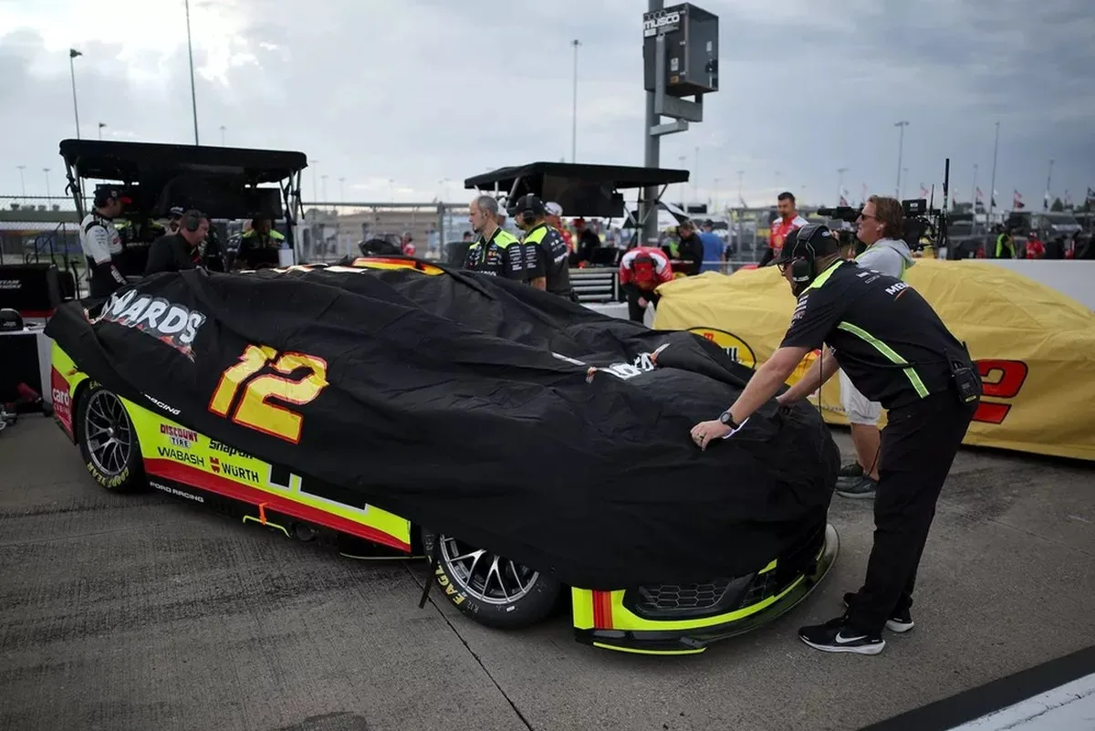 Ryan Blaney car cover during rain delay, No. 12 Team Penske Ford