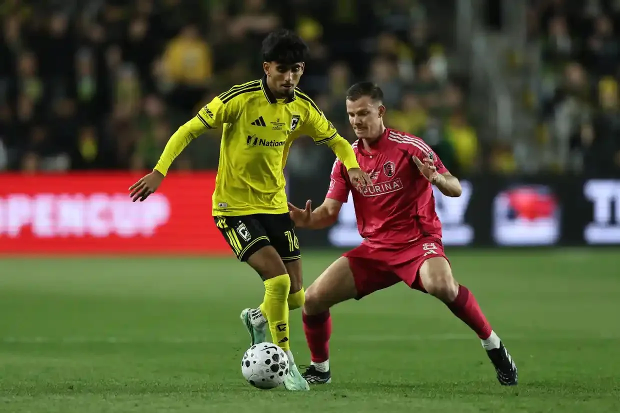 Columbus Crew’s Taha Habroune dribbles past a St Louis City defender in a match