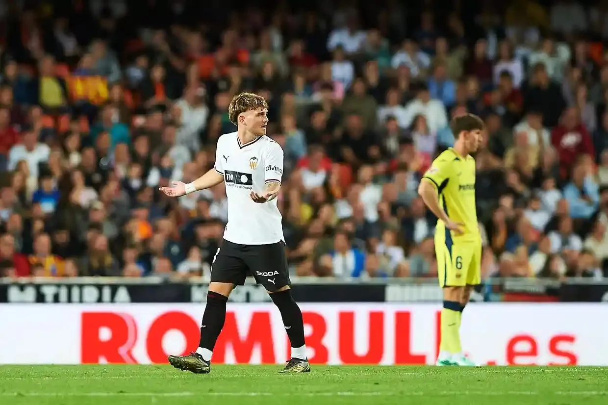Valencia’s Harvey Elliott looks back as he walks off the pitch after his red card