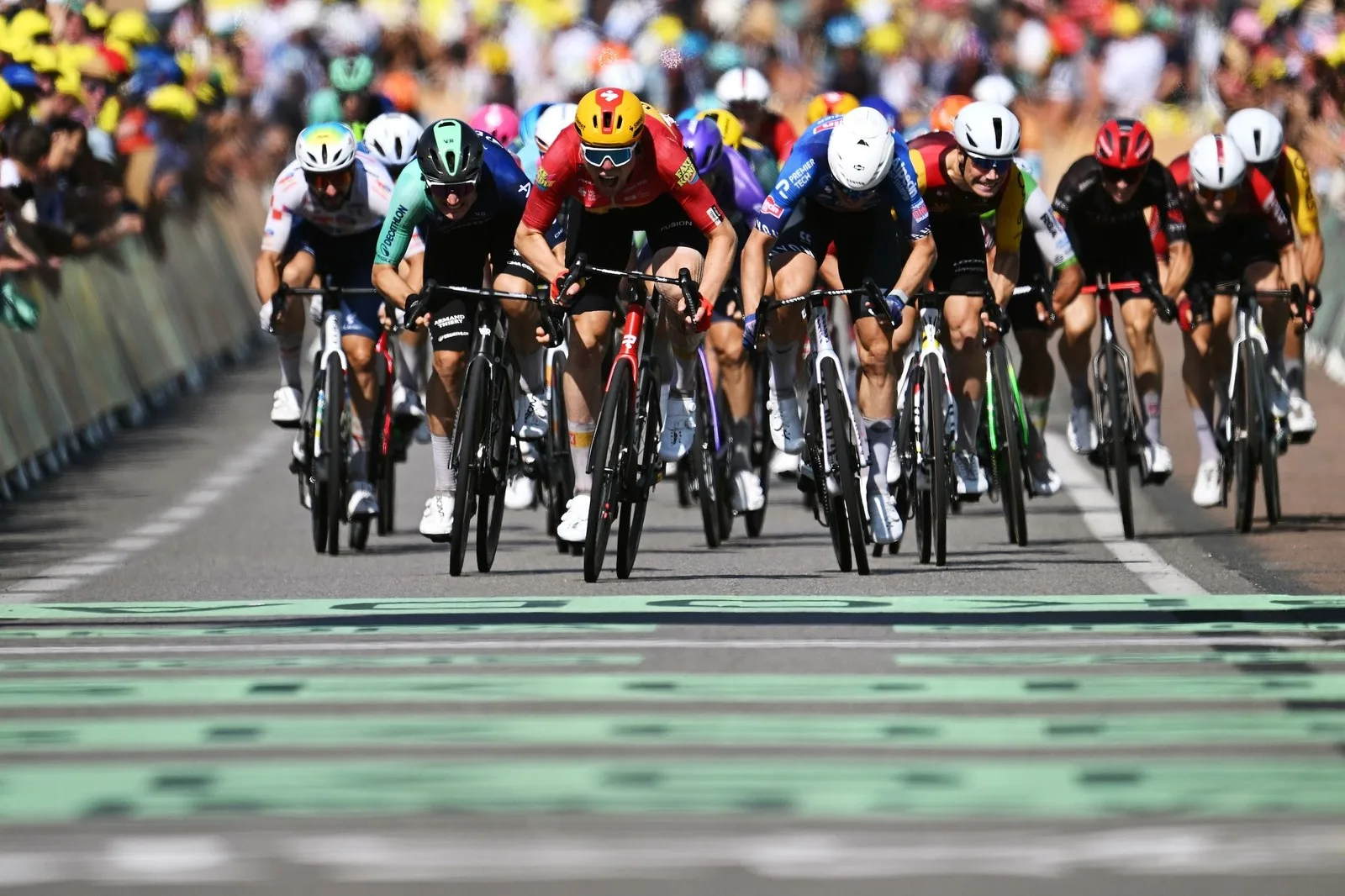 Olav Kooij, stage winner Soren Waerenskjold, Jasper Philipsen sprint at finish line during the 113th Tour de France 2026