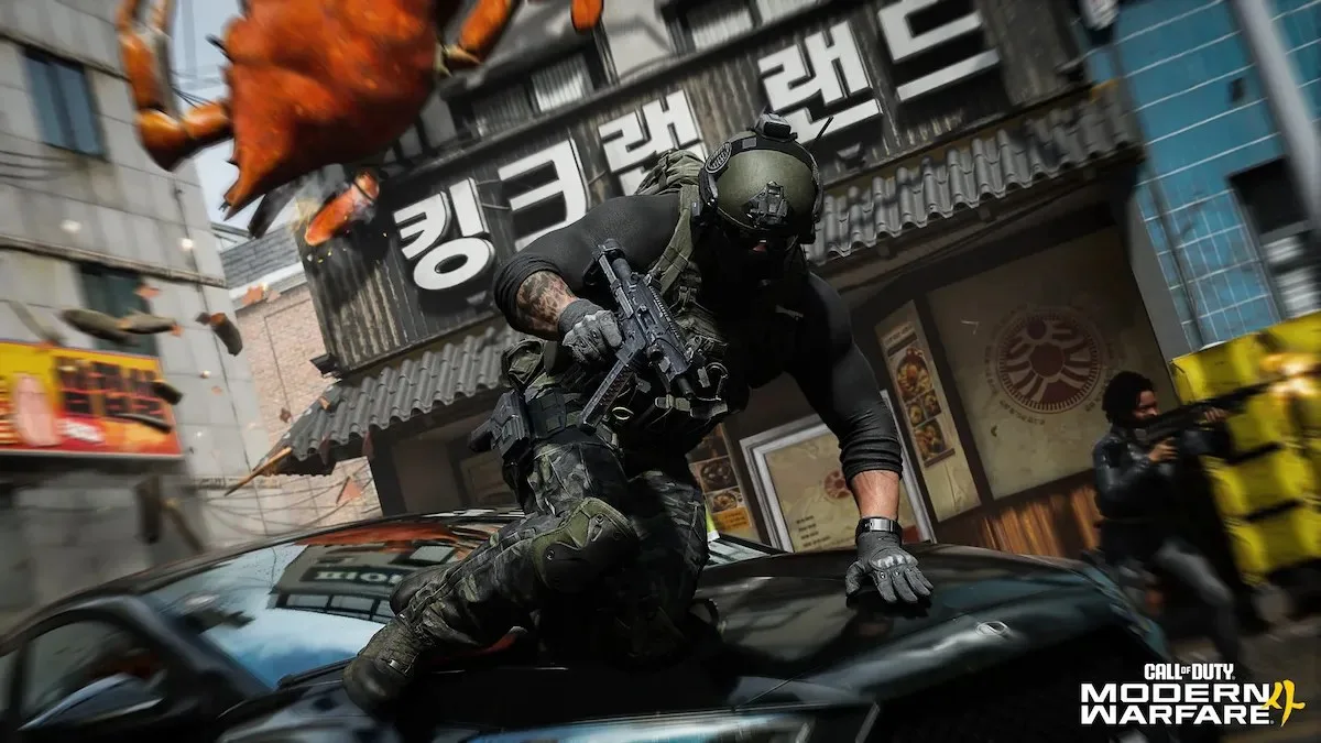 An operator sliding over a car in MW4