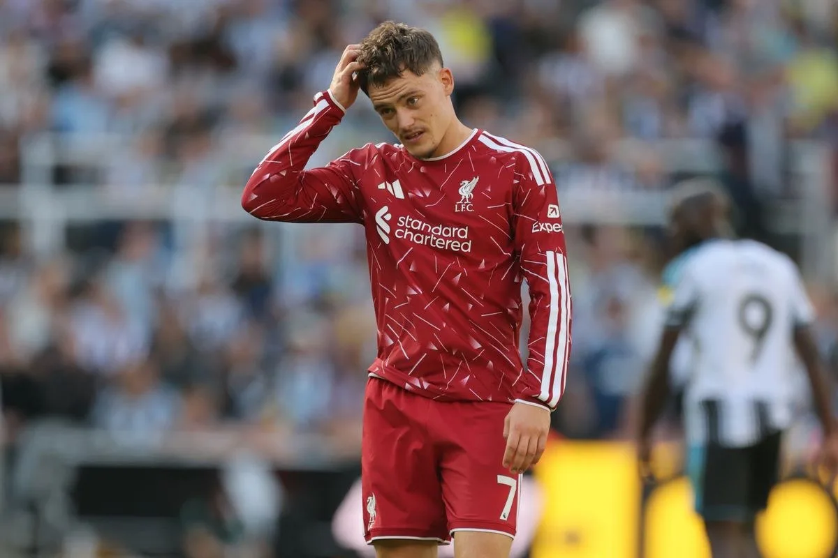 Florian Wirtz stood on the pitch for Liverpool, scratching his head.