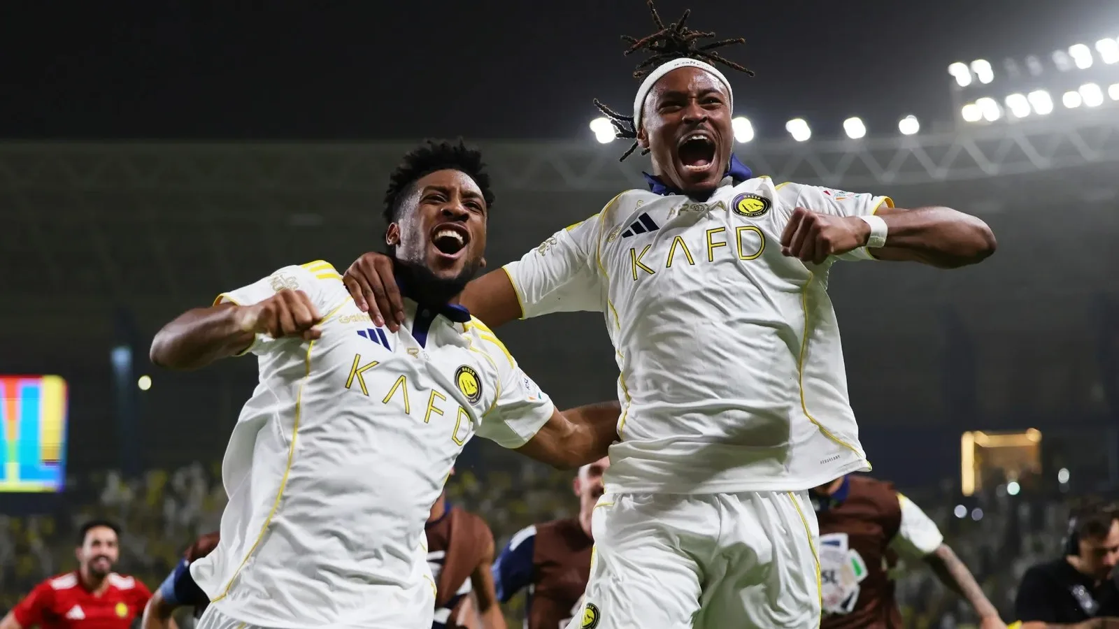 Kingsley Coman of Al Nassr celebrates alongside Mohamed Simakan.