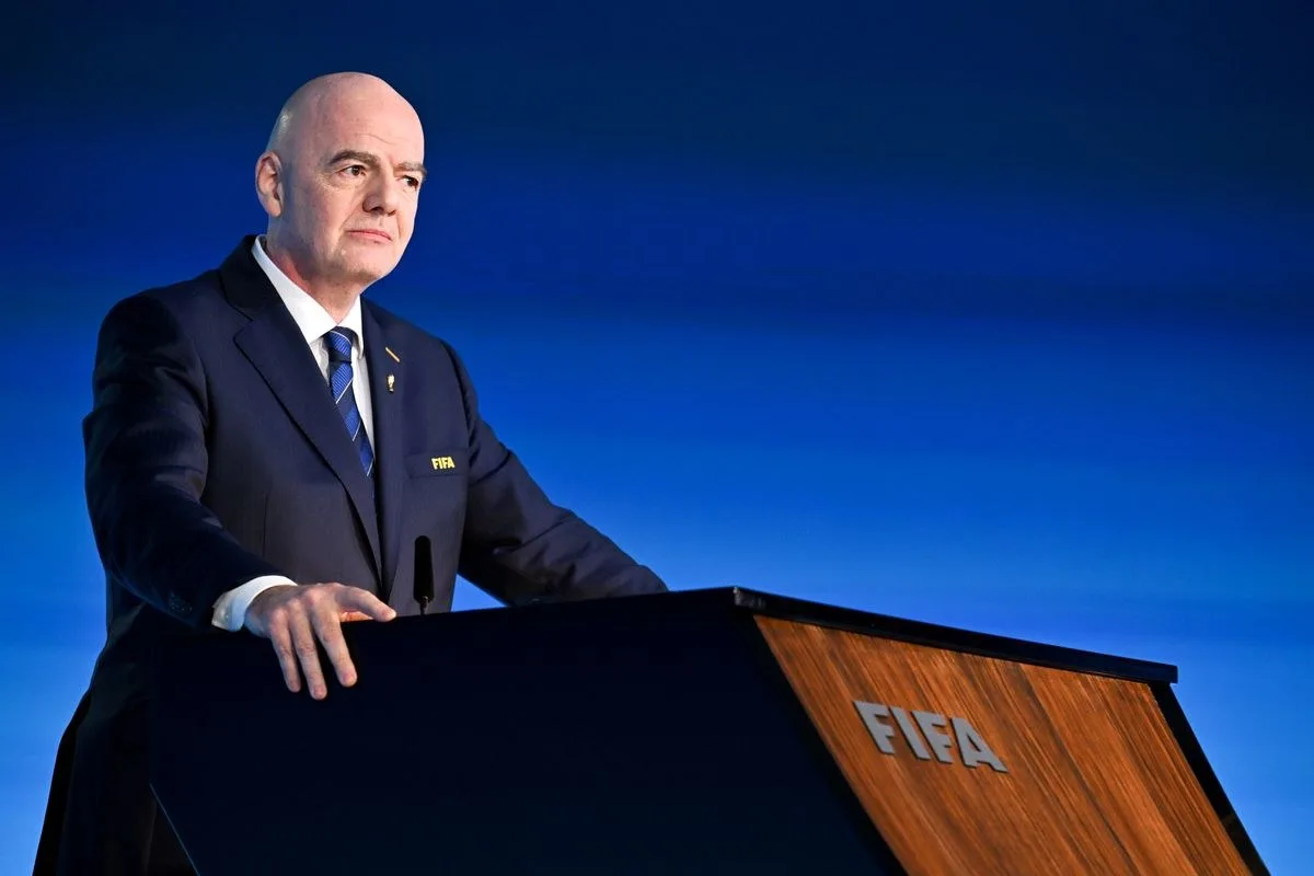 Gianni Infantino stood on stage at a FIFA presser.