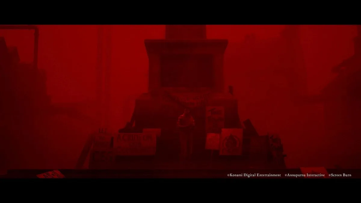 The town center of Silent Hill Townfall with a red sky and protest signs.