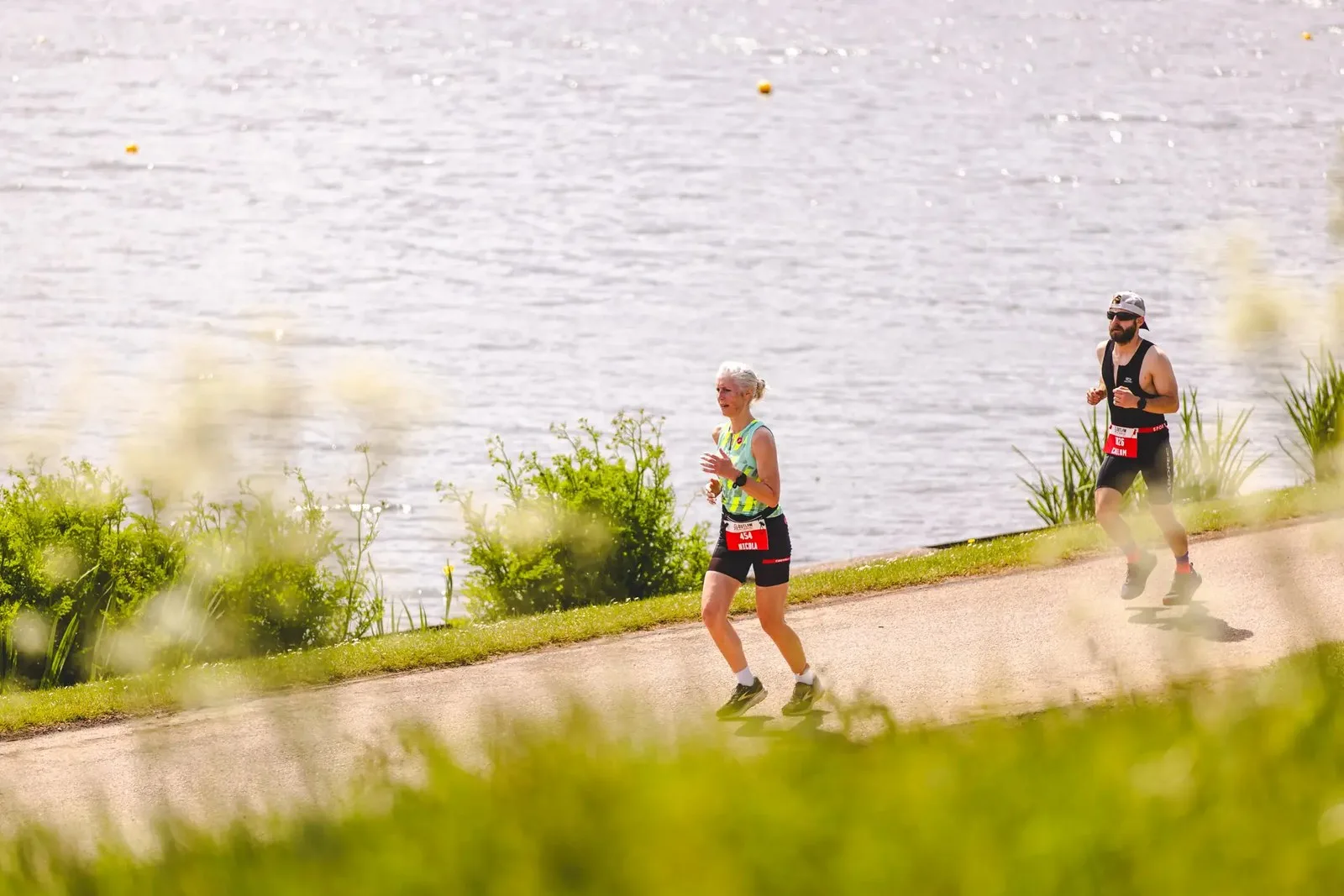 Women running during an Ironman distance triathlon 